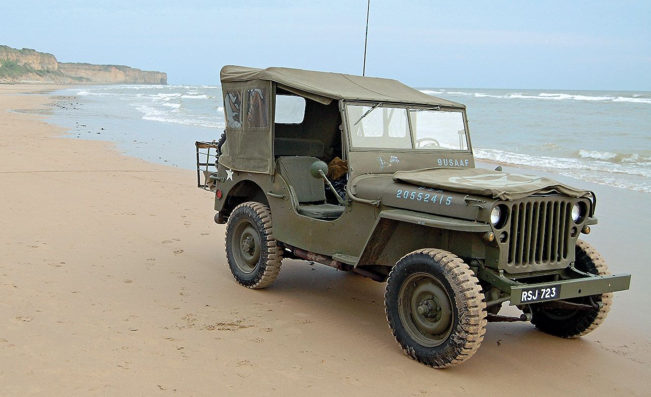 storming-normandie-in-a-world-war-ii-jeep-utility-car-and-driver-photo-294741-s-original
