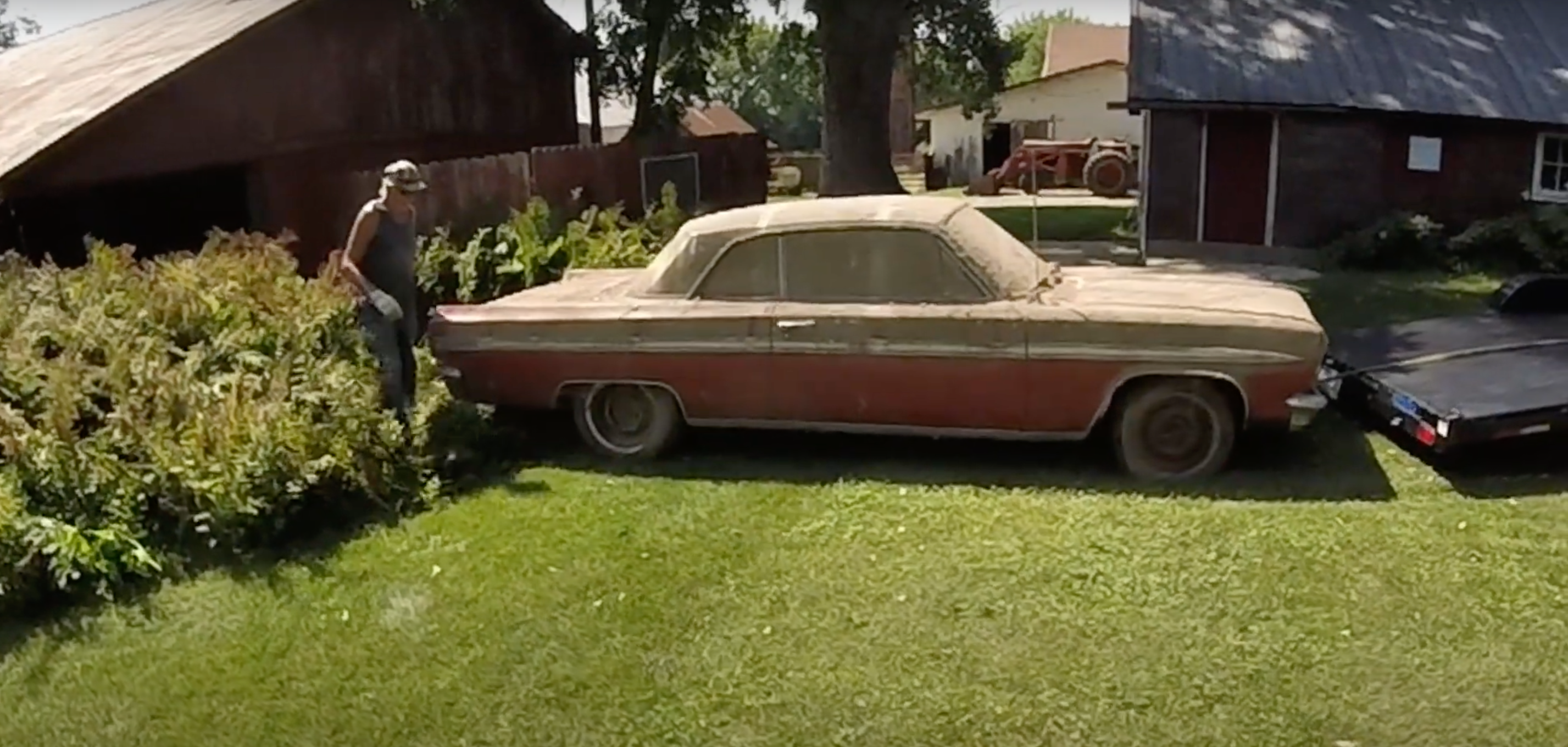 1963 Oldsmobile Jetfire being towed from a barn