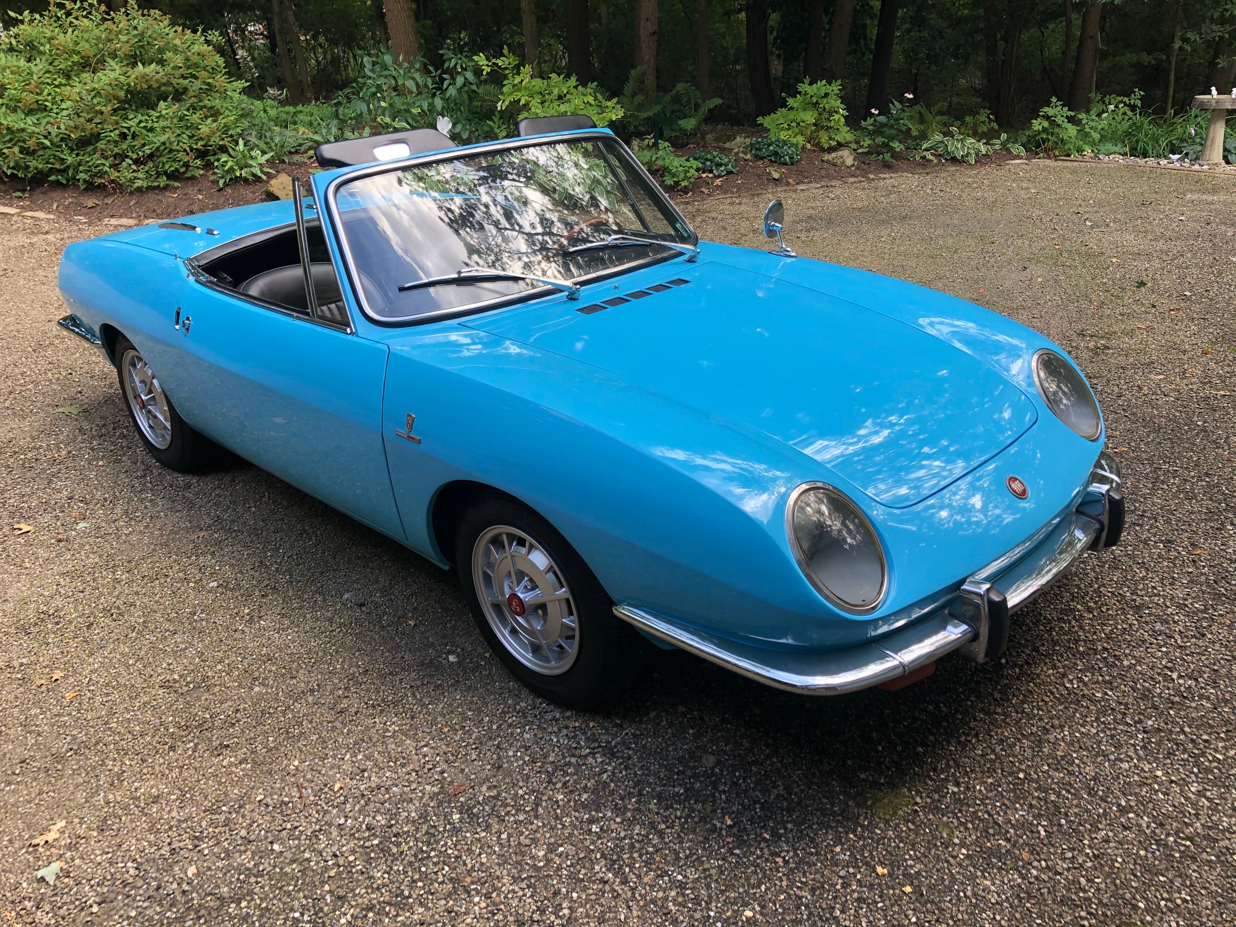 1967 Fiat 850 Spider: Affordable classic sports car.