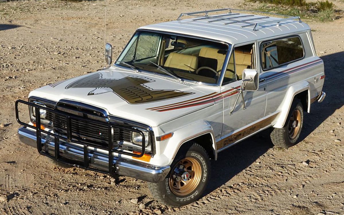 White 1979 Jeep Cherokee Golden Eagle Parked Off-Road