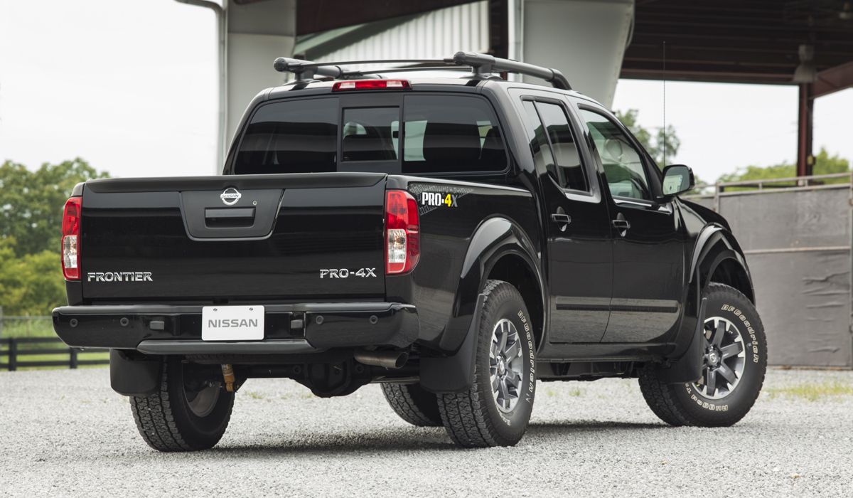 Black 2014 Nissan Frontier PRO-4X Parked On Driveway