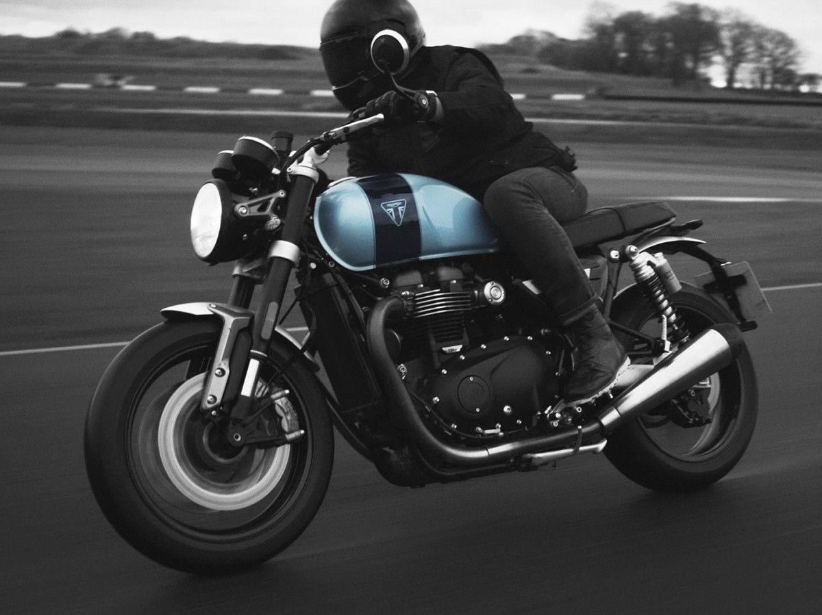 A Person Riding A Triumph Speed Twin Limited Breitling Edition Motorcycle