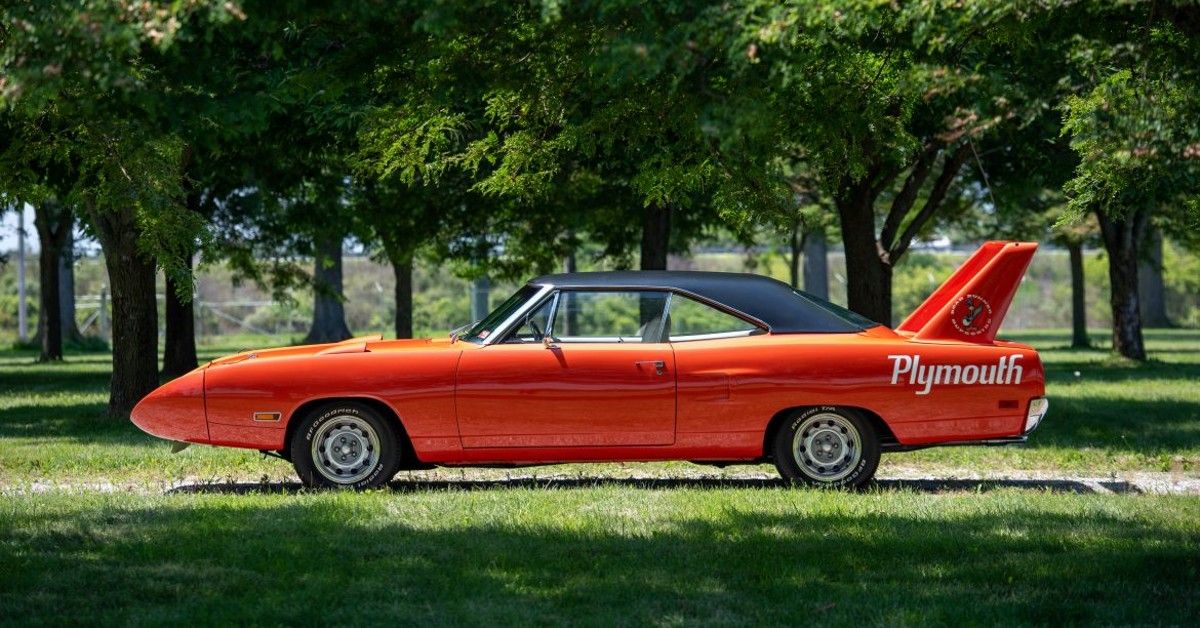 The Side View Of A Red 1970 Plymouth Superbird