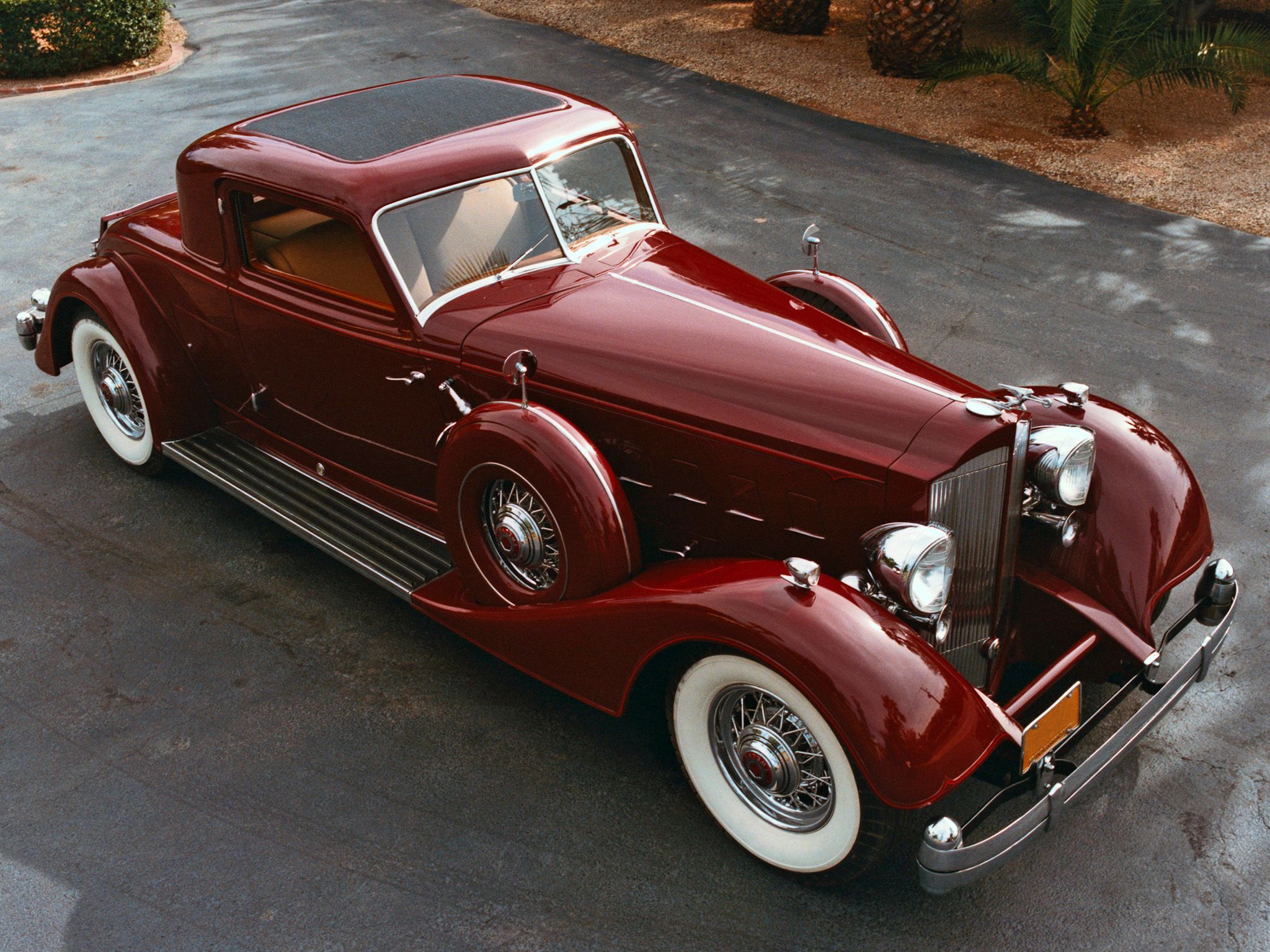 A Red 1934 Packard Twelve Coupe