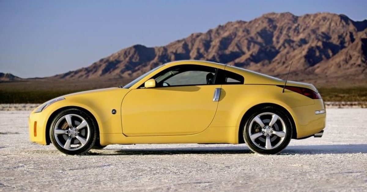 The Side View Of A Yellow Nissan 350Z