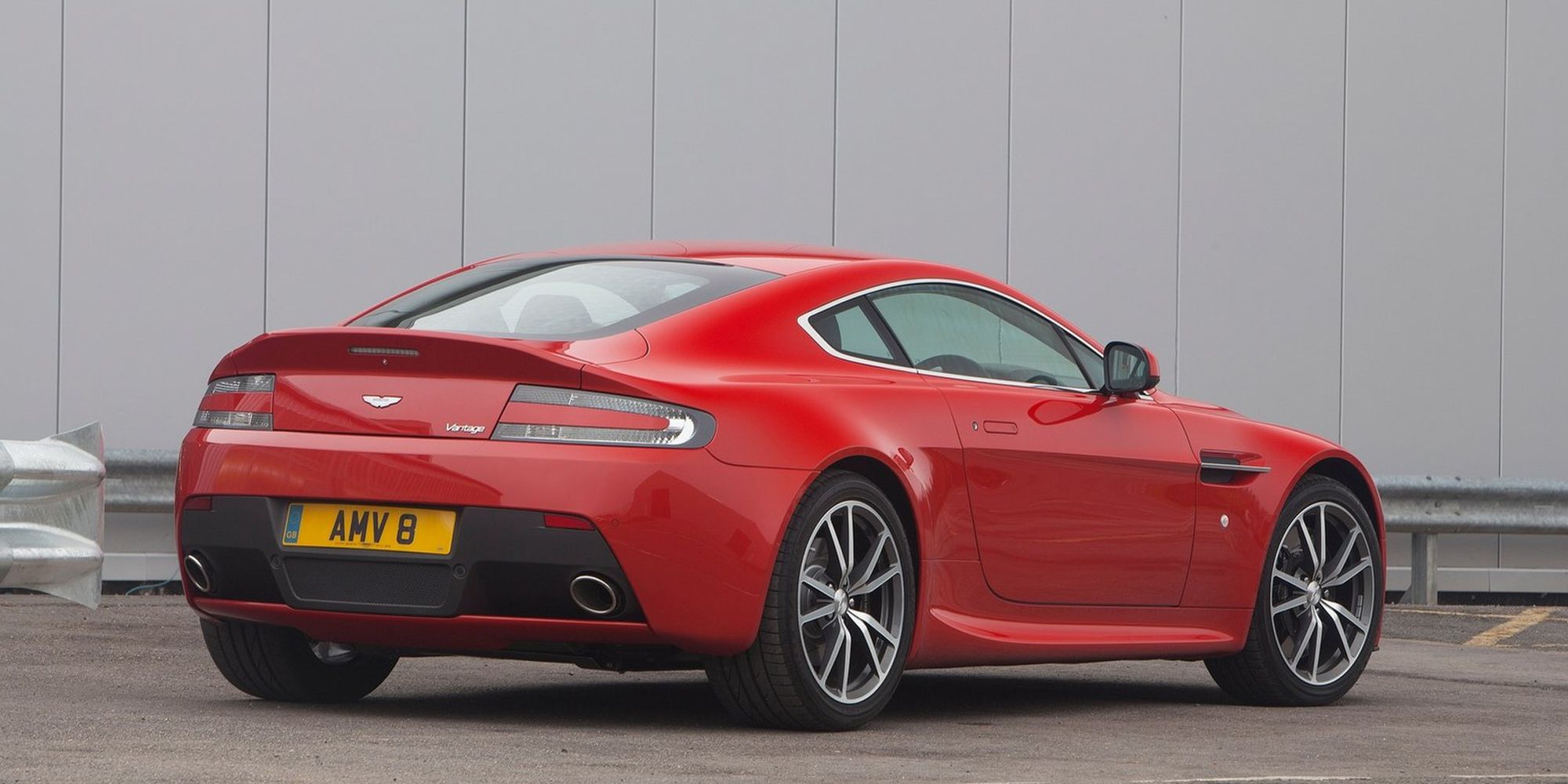 Rear 3/4 view of a red V8 Vantage
