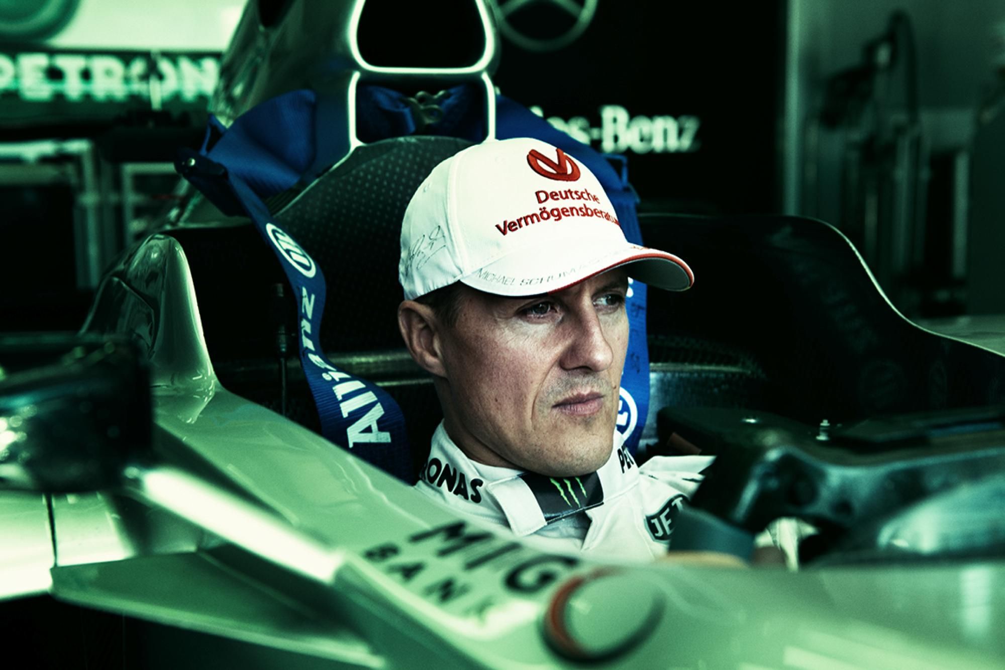 michael-schumacher-sitting-in-F1-car