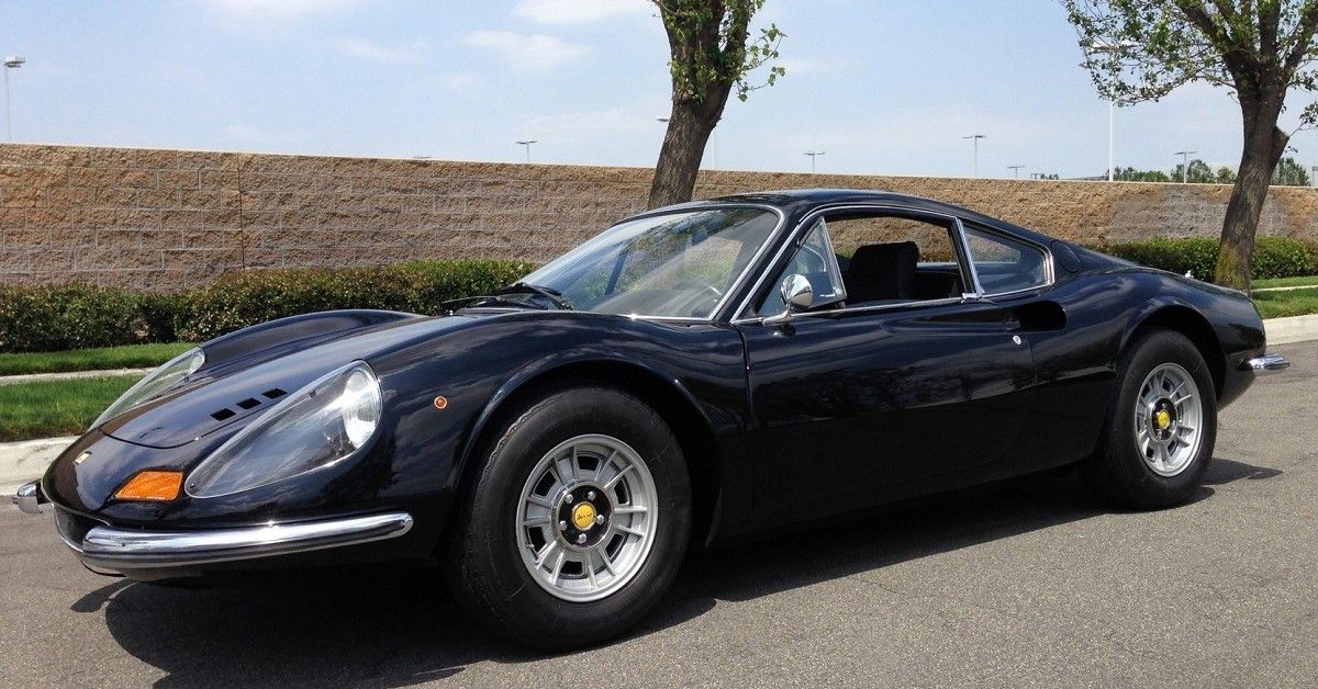 Ferrari Dino 246, black, front quarter view, parked side of road