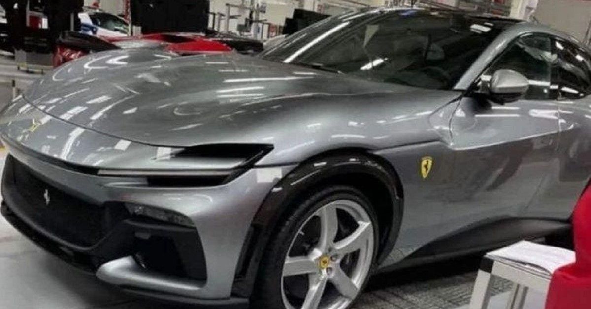 Ferrari Purosangue photo leak, grey, in garage, front quarter view
