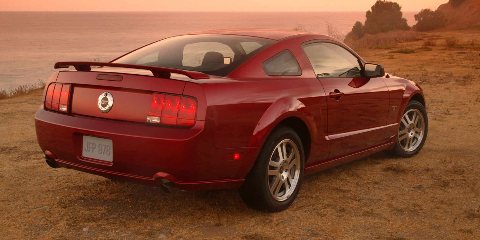 Rear 3/4 view of a red S-197 Mustang