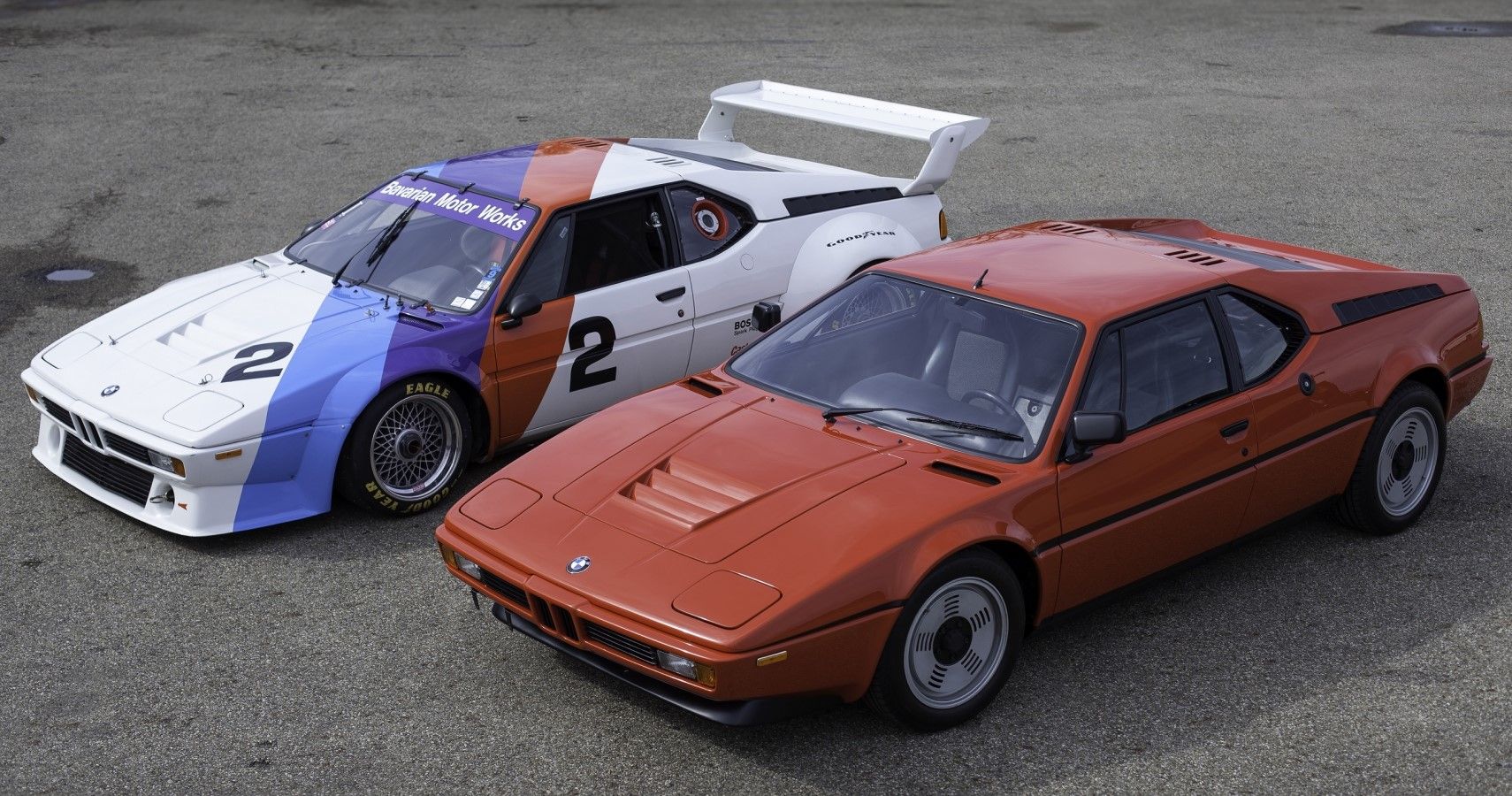 BMW M1 and M1 racecar front third quarter view