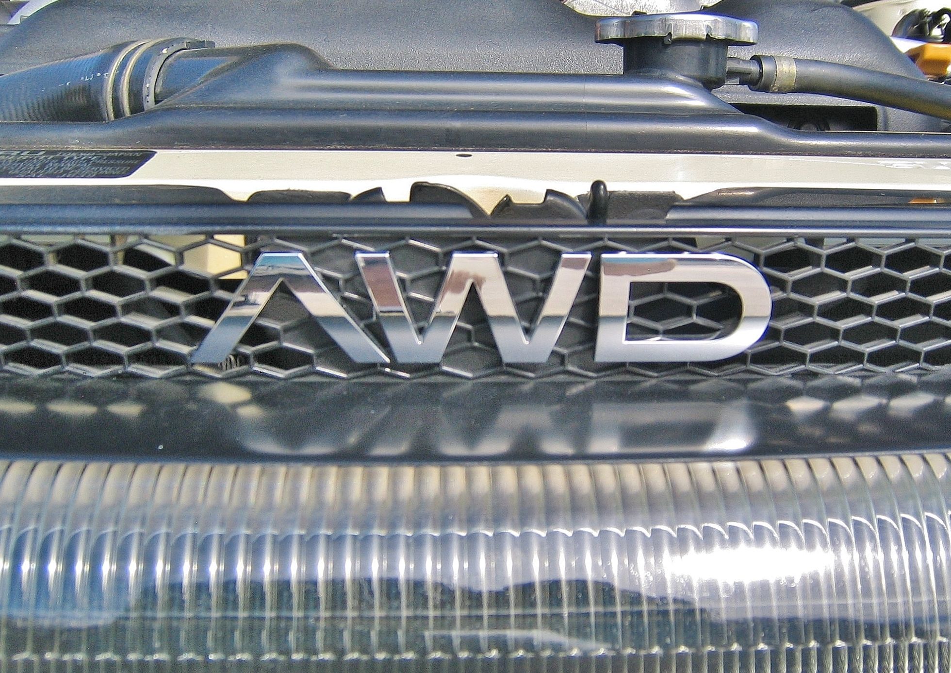 Subaru SVX AWD badge