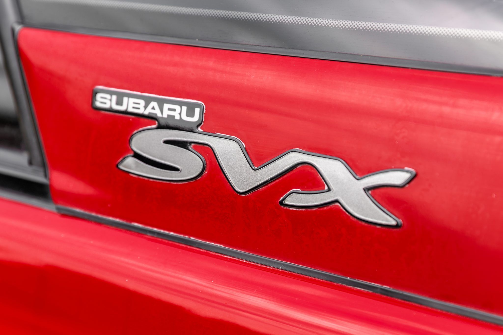 Subaru SVX badge