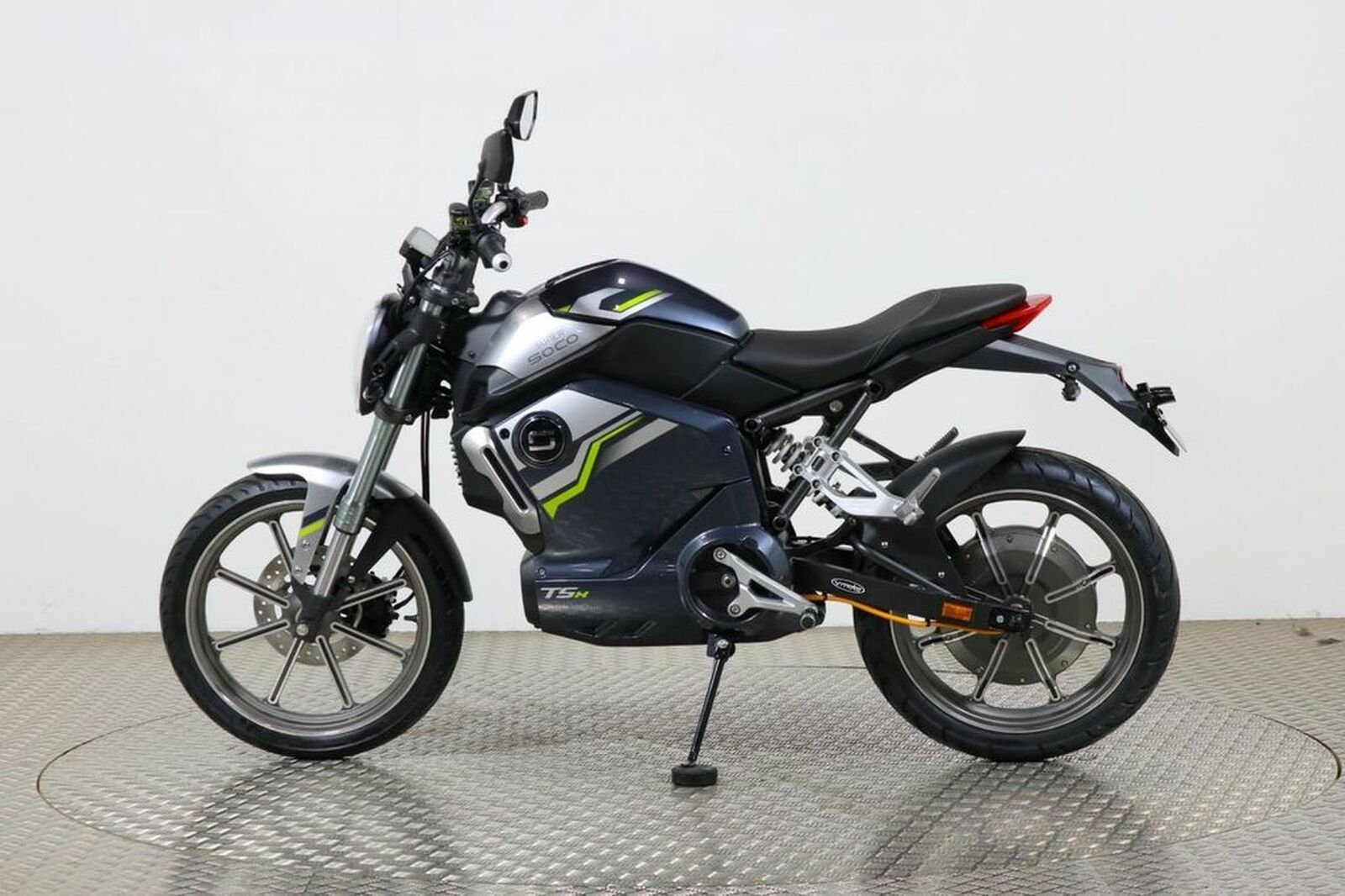 The Side View Of A 2020 Super Soco TSX Motorcycle