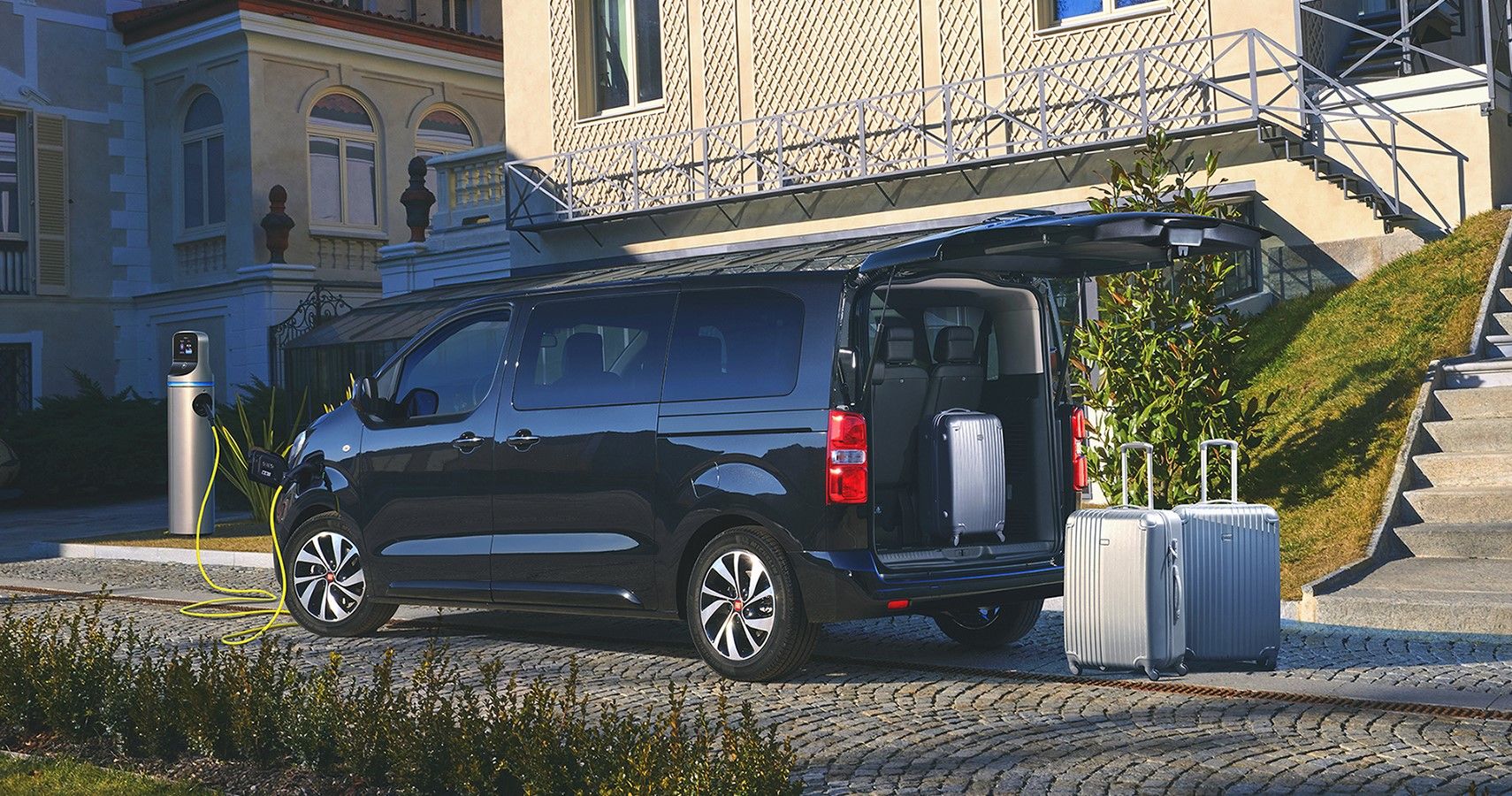 2022 Fiat E-Ulysse rear third quarter view at charging station