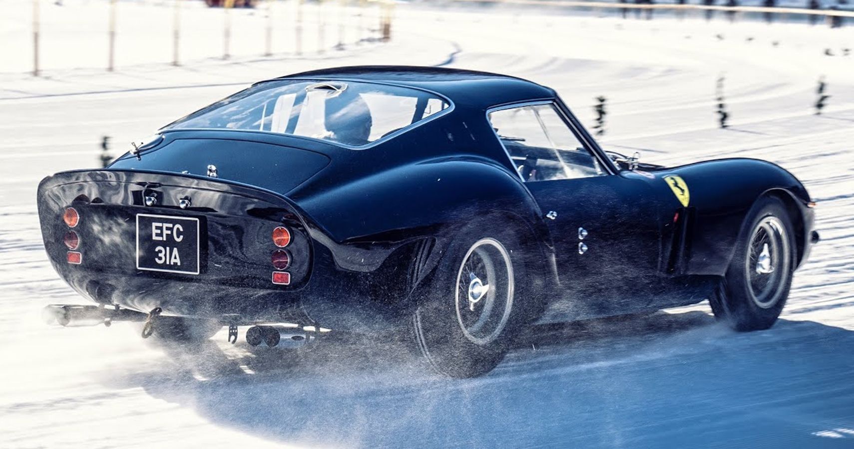 dark blue 1963 Ferrari GTO 250 ICE St Moritz drive on lake
