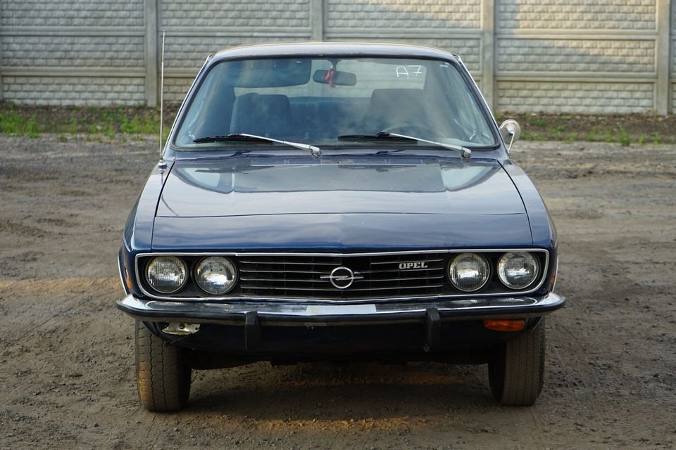 Opel Manta, dark blue, front-on, parked
