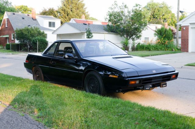1986-subaru-xt-turbo-4wd-manual-coupe black quarter view