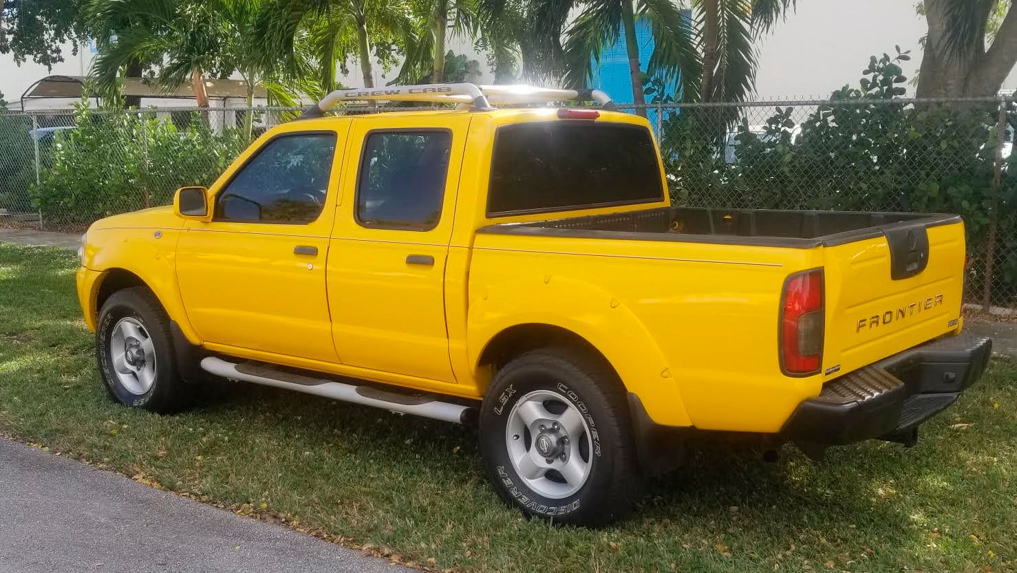 Yellow 2001 Nissan Frontier