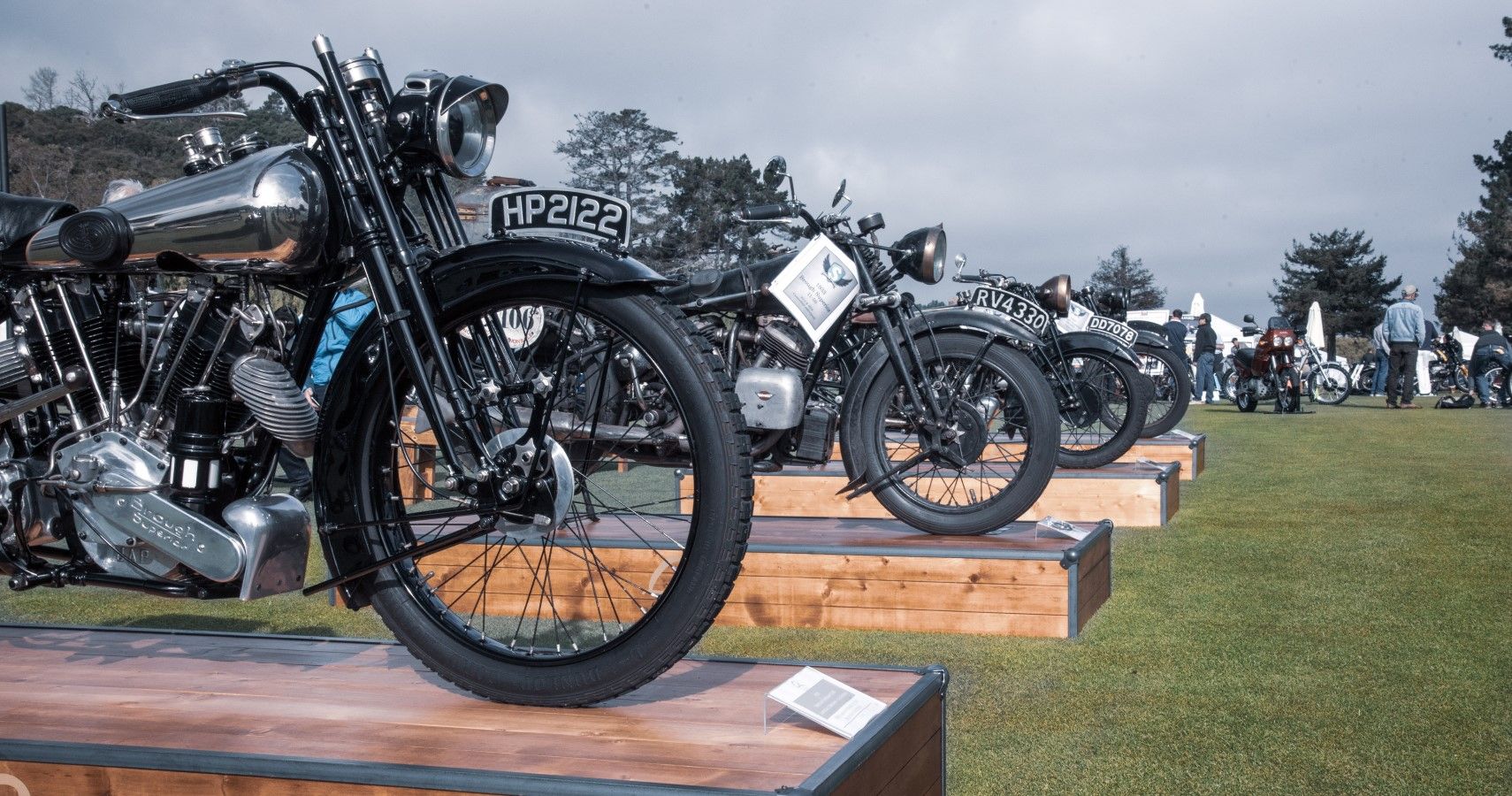 Classic motorcycles from Indian and Harley-Davidson lined at a Quail Motorcycle Gathering