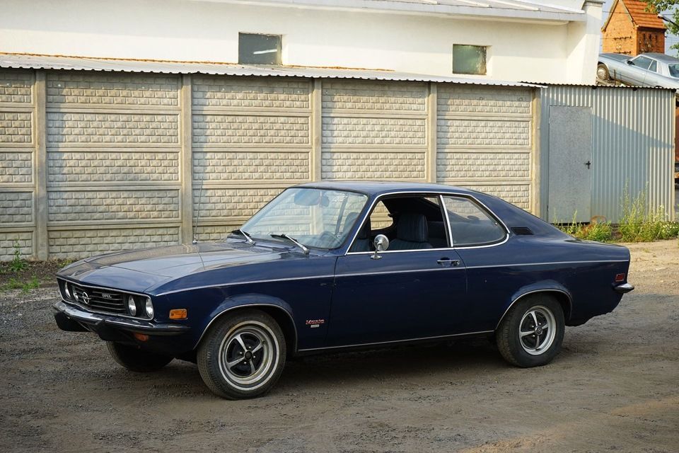 Opel Manta, dark blue, front quarter view, parked