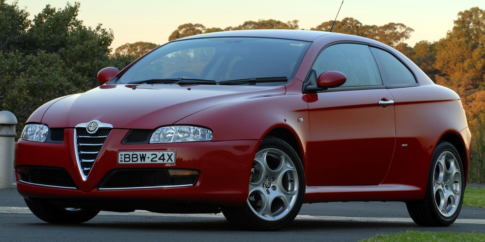 Front 3/4 view of a red Alfa GT