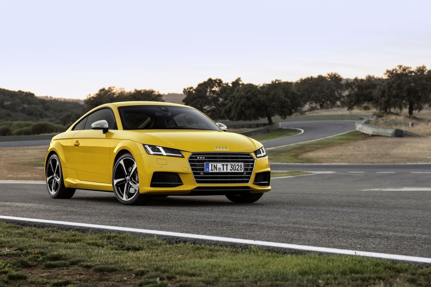 2019 Audi TTS yellow sports car parked