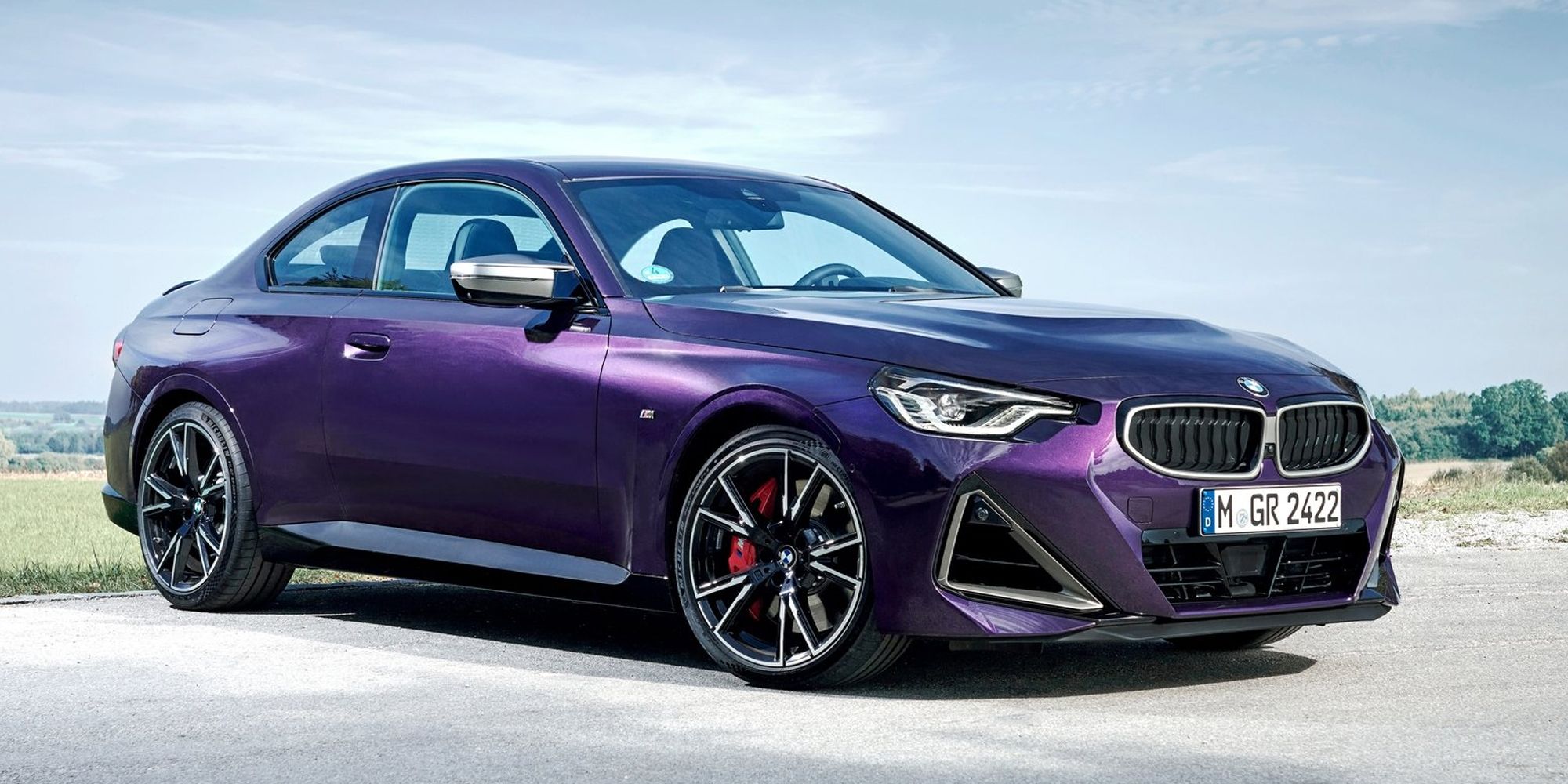 Front 3/4 view of a purple M240i