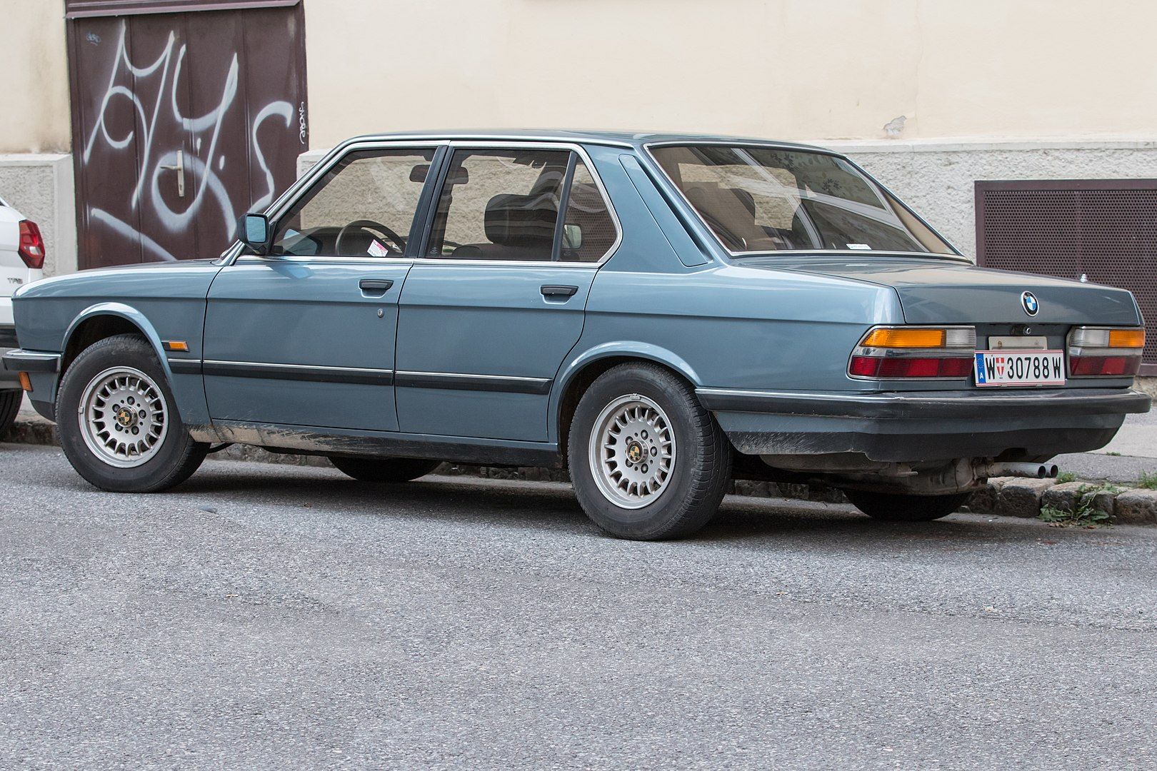 BMW 535i side and rear view, greyish blue