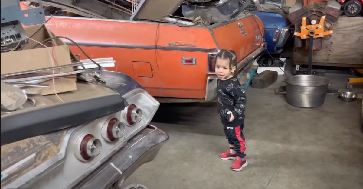 DezzySpeedShop - son in his workshop identifying the different cars