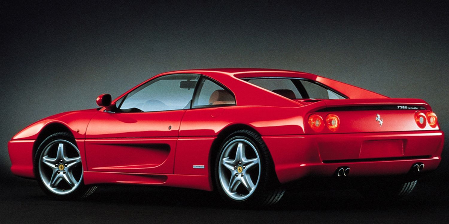 Rear 3/4 view of a red F355, studio shot