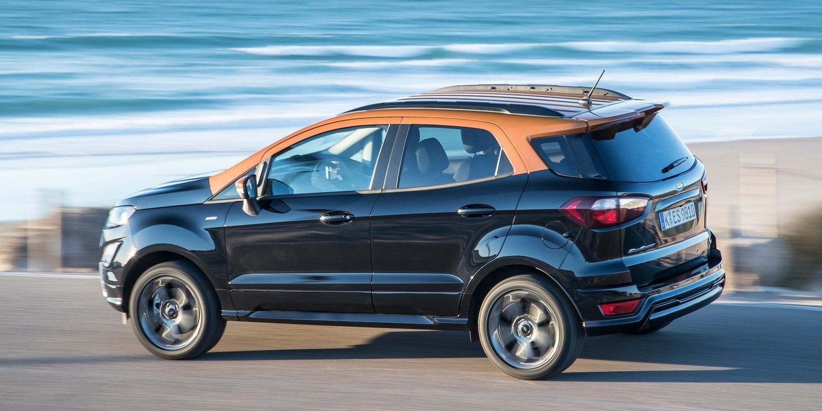 Ford EcoSport side profile on a coastal road