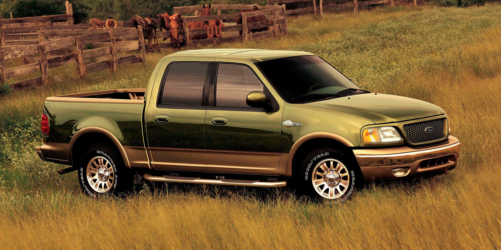 Front 3/4 view of a 2001 F-150 King Ranch on a field