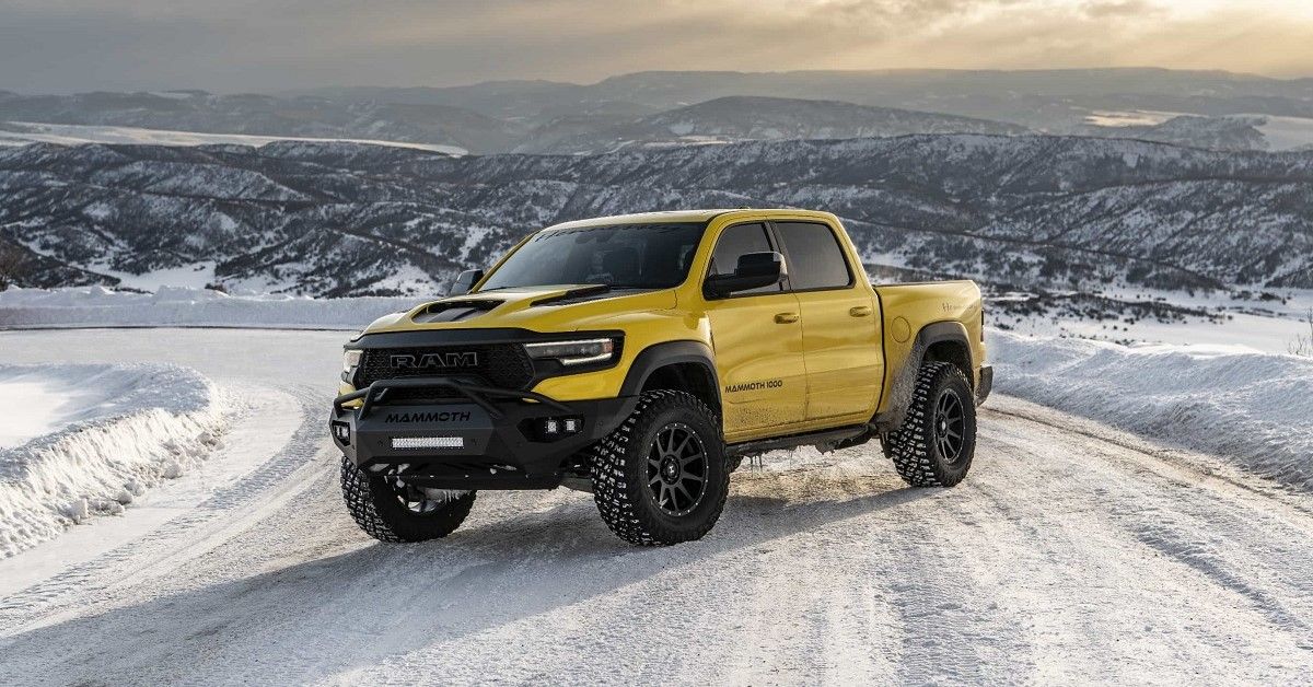 Hennessey Ram 1500 TRX Mammoth, yellow, in snow, front quarter shot