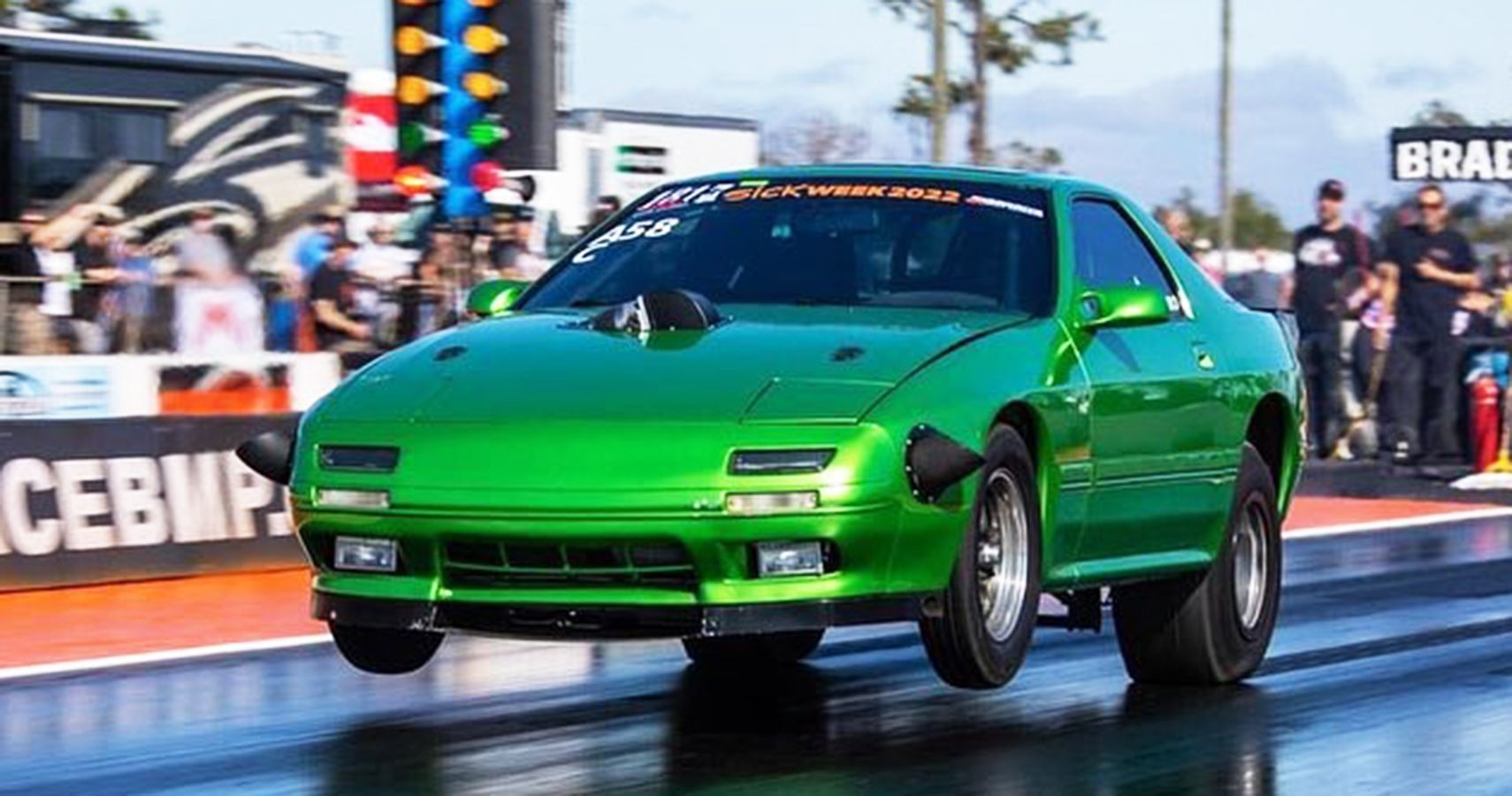 Green Mazda RX-7 Drag racing