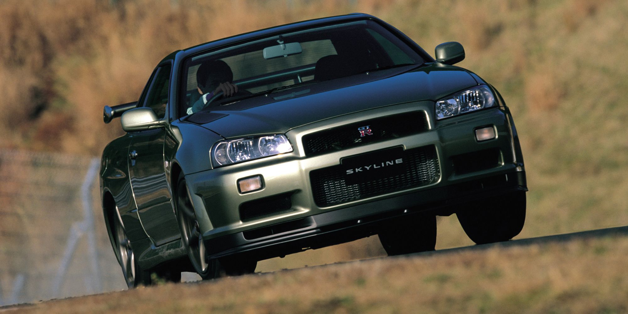 The front of a R34 GTR on the move, Milennium Jade