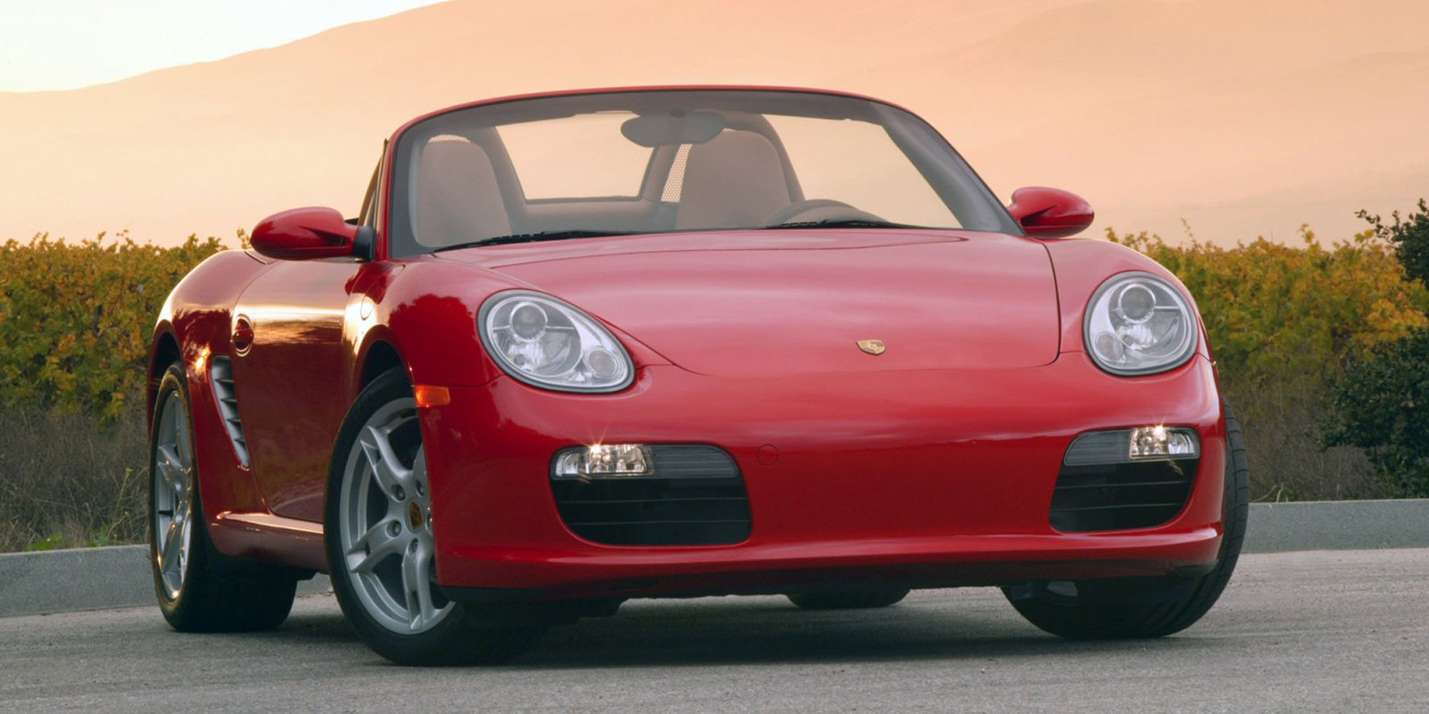 The front of a red 987 Boxster