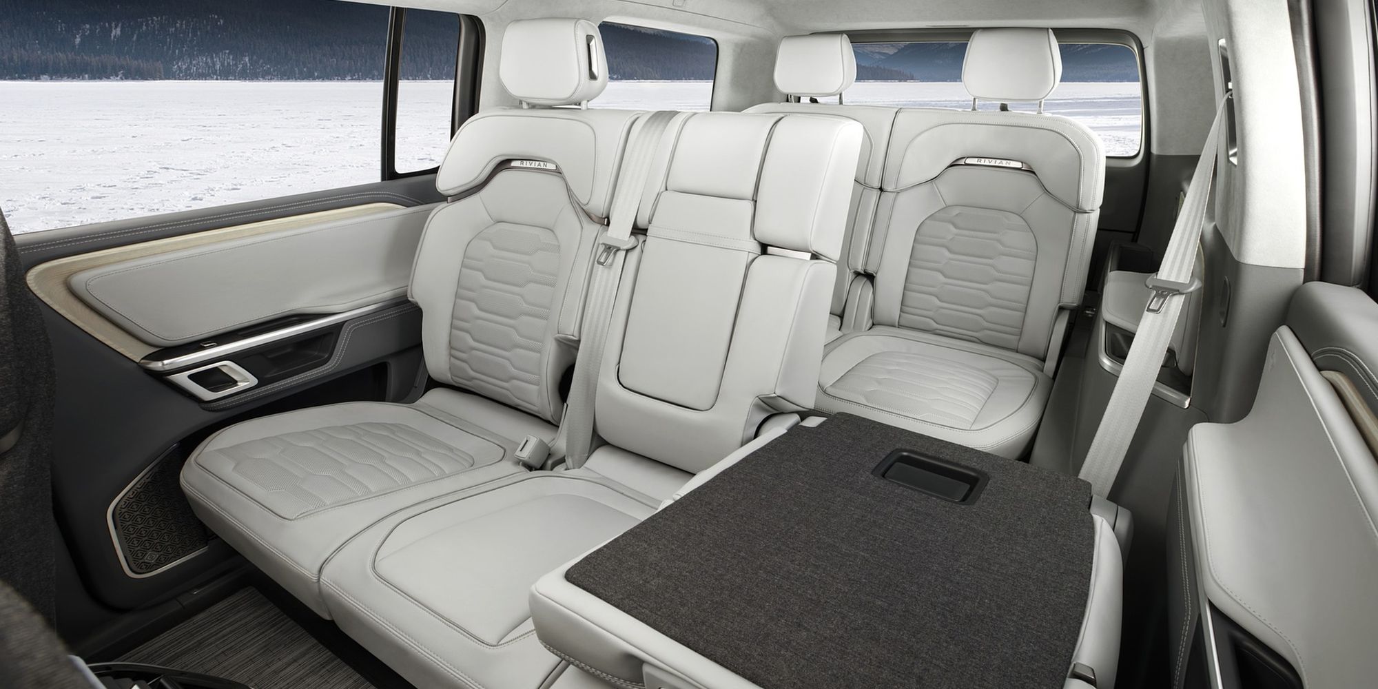 The rear seats in the R1S, driver's side folded down