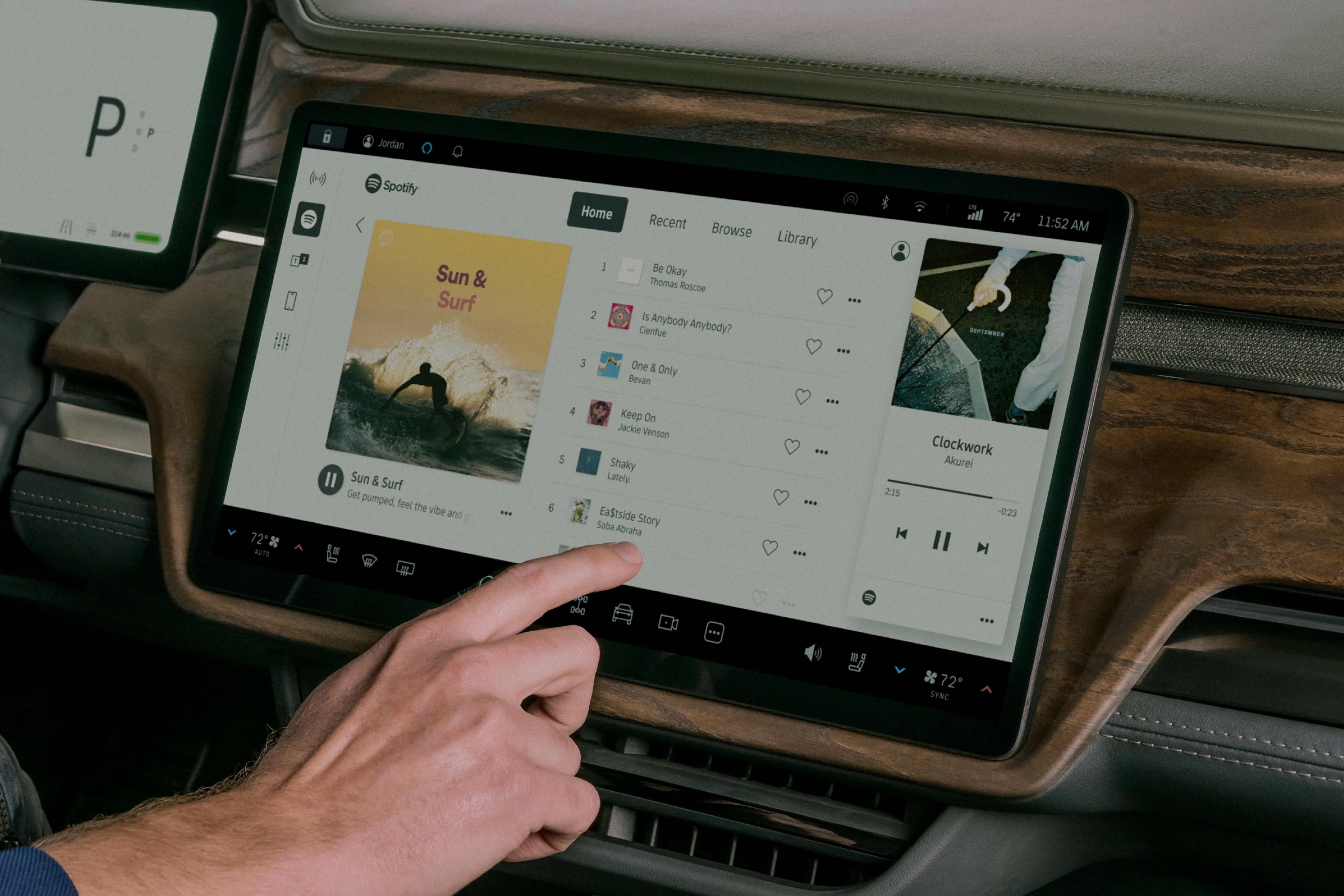 Rivian R1S touchscreen, with hand