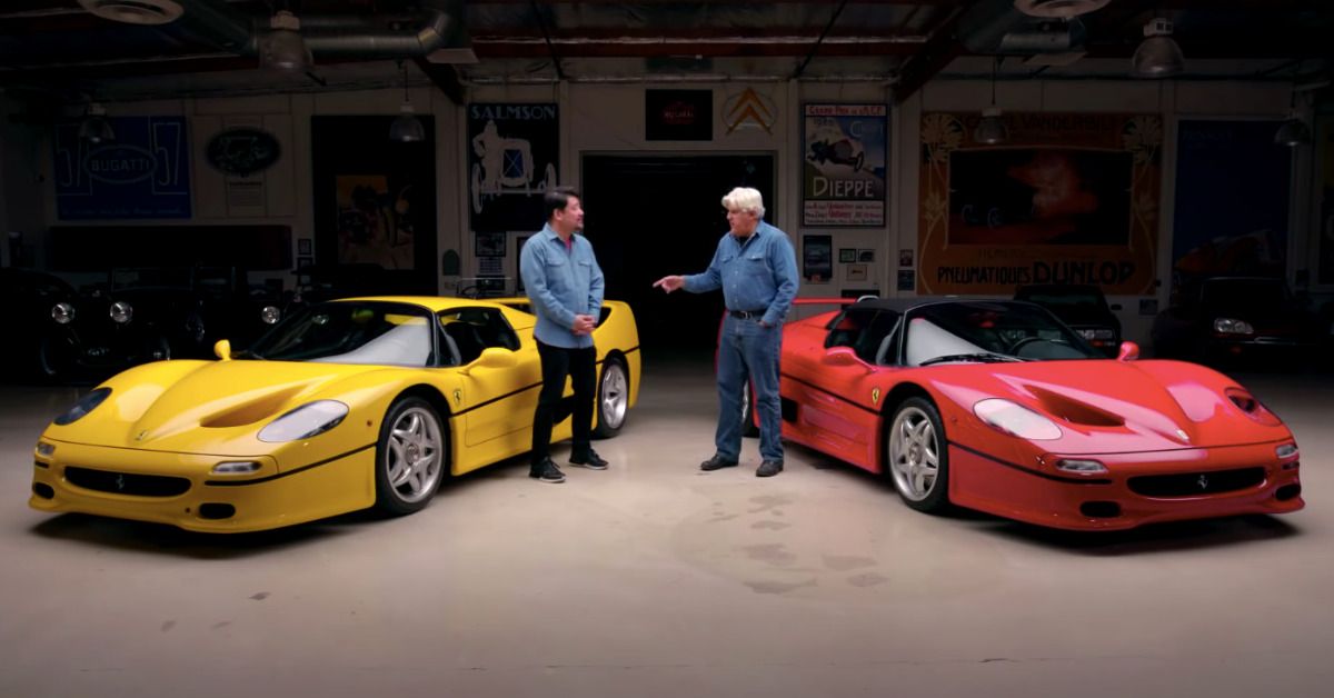 Inside Jay Leno's Garage with JL standing between a yellow and a red Ferrari F50 talking to David Lee