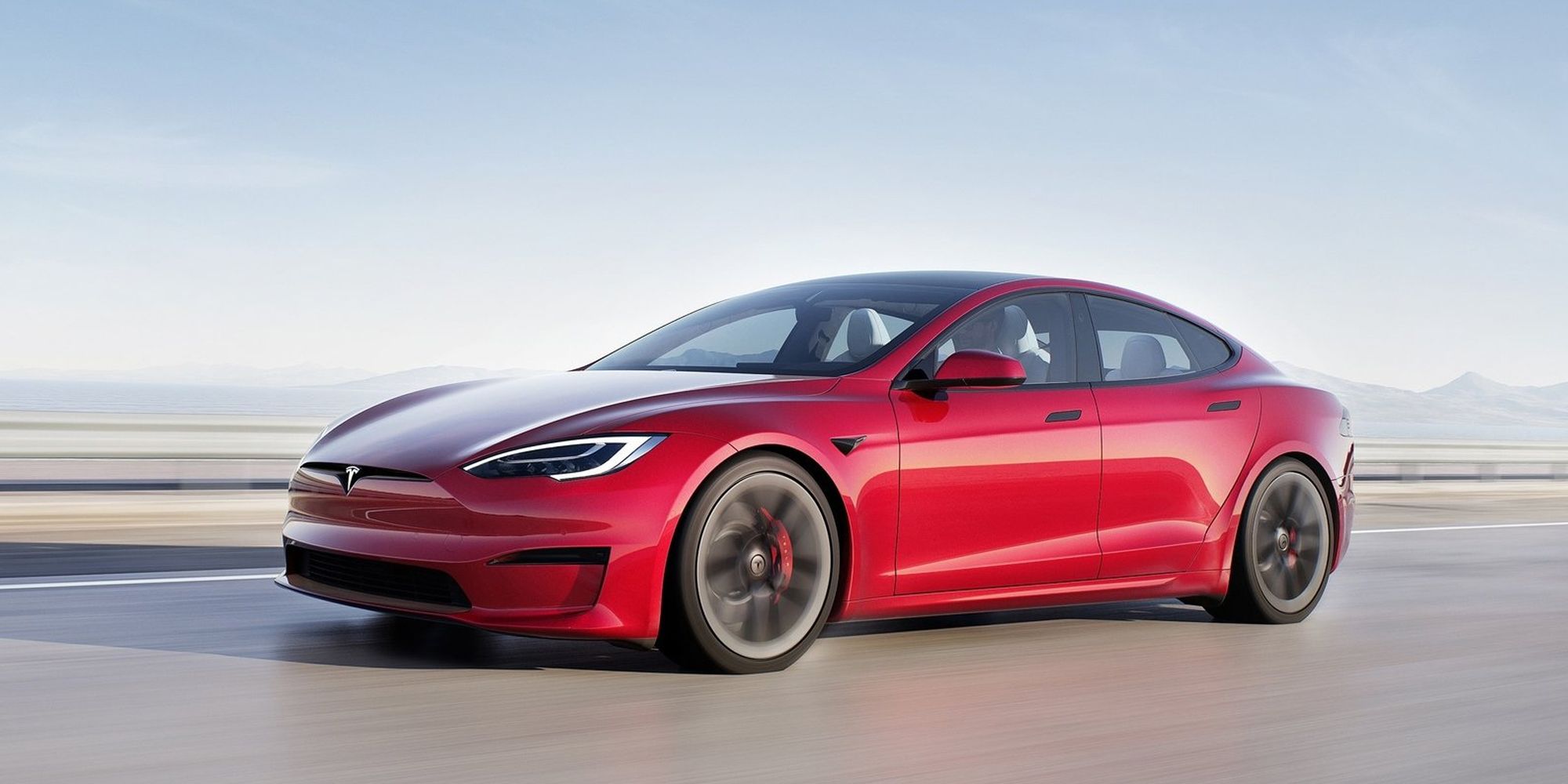 Tesla Model S Front Quarter Red Driving