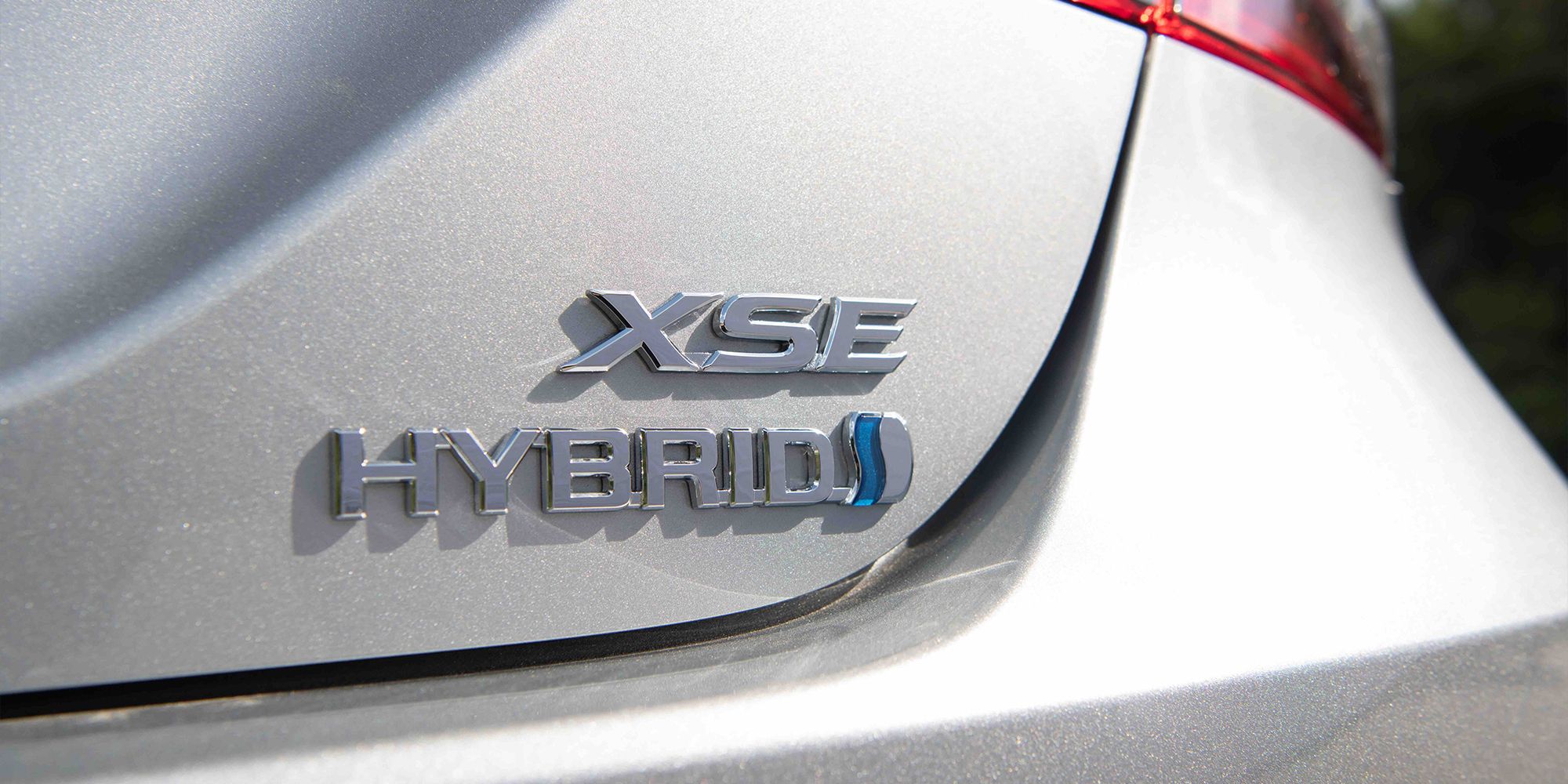 The trunk badge on the Camry XSE Hybrid
