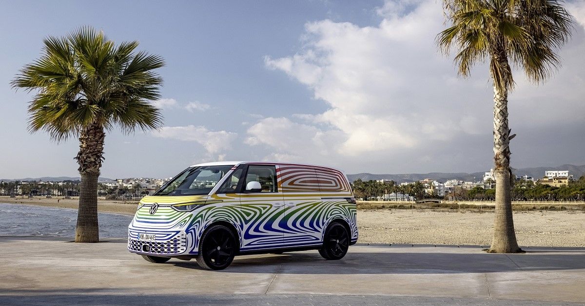 Volkswagen ID. BUZZ, multicolor, front quarter view, parked near palm trees