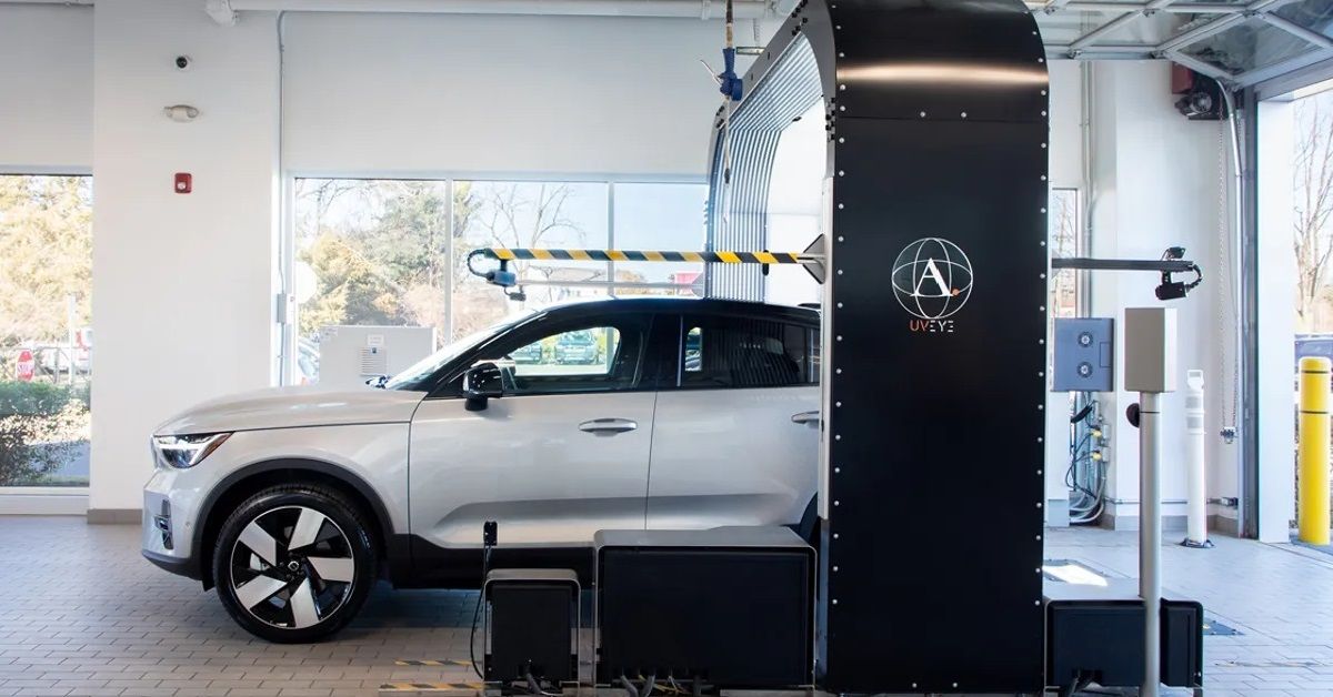 Volvo's Automated Vehicle-Inspection System at work on an SUV, side view