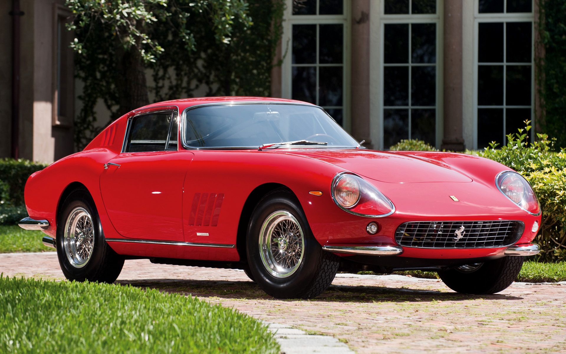 The 1964 Ferrari 275 GTB on display for sale.