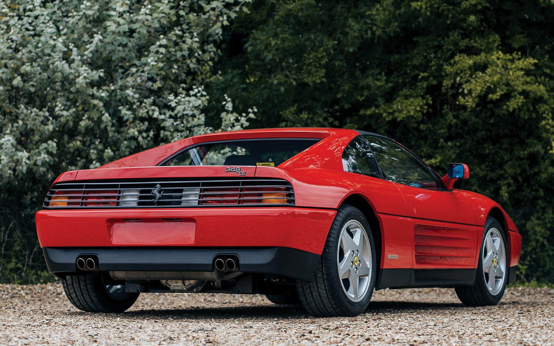A rear view of the 1989 Ferrari 348 TS.