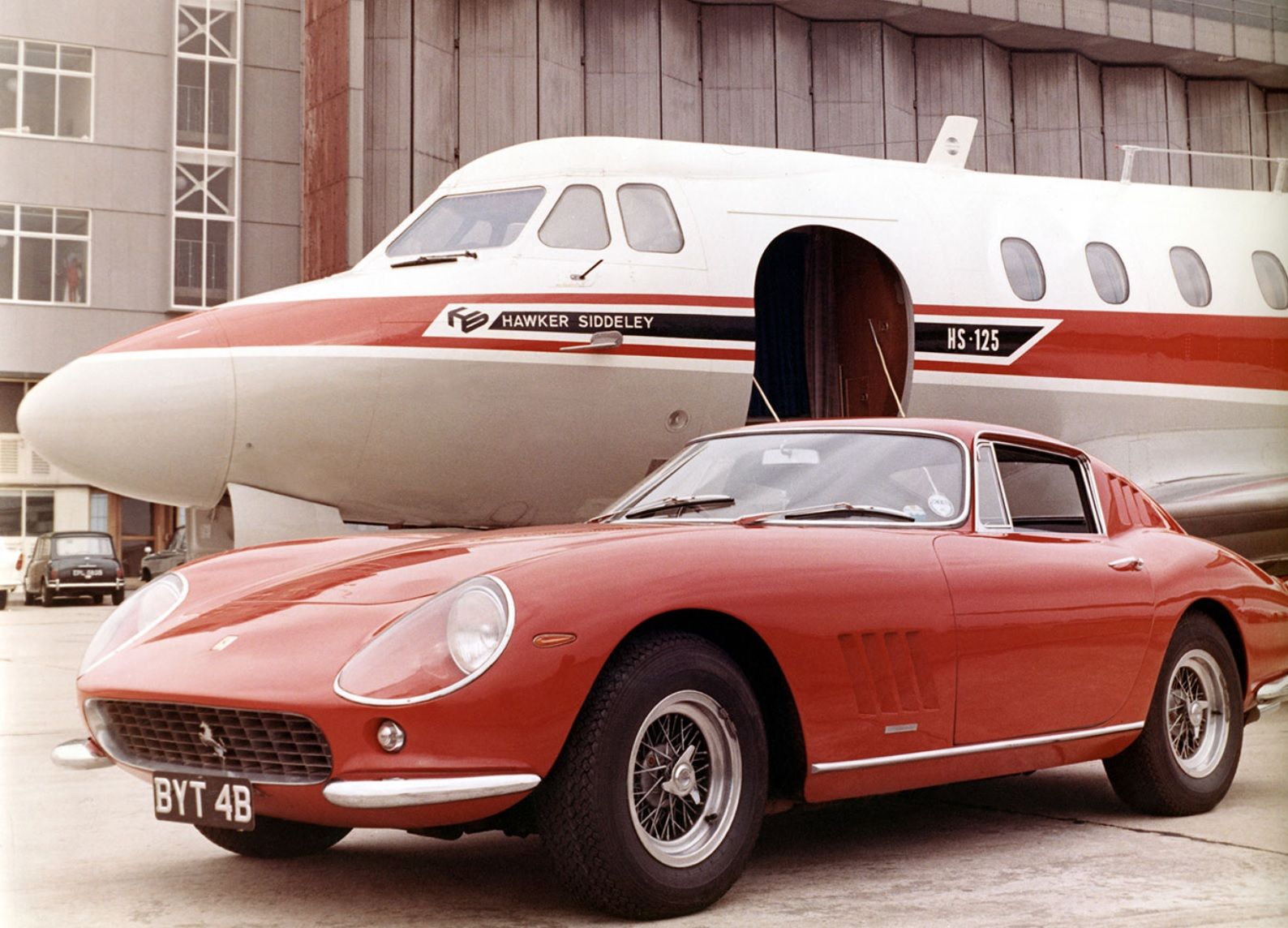 The 1964 Ferrari 275 GTB contrasted to a plane.