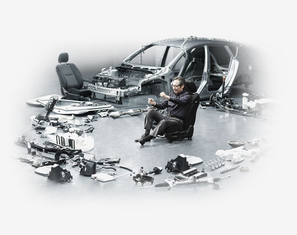 Mazda's engineer working on a car prototype.