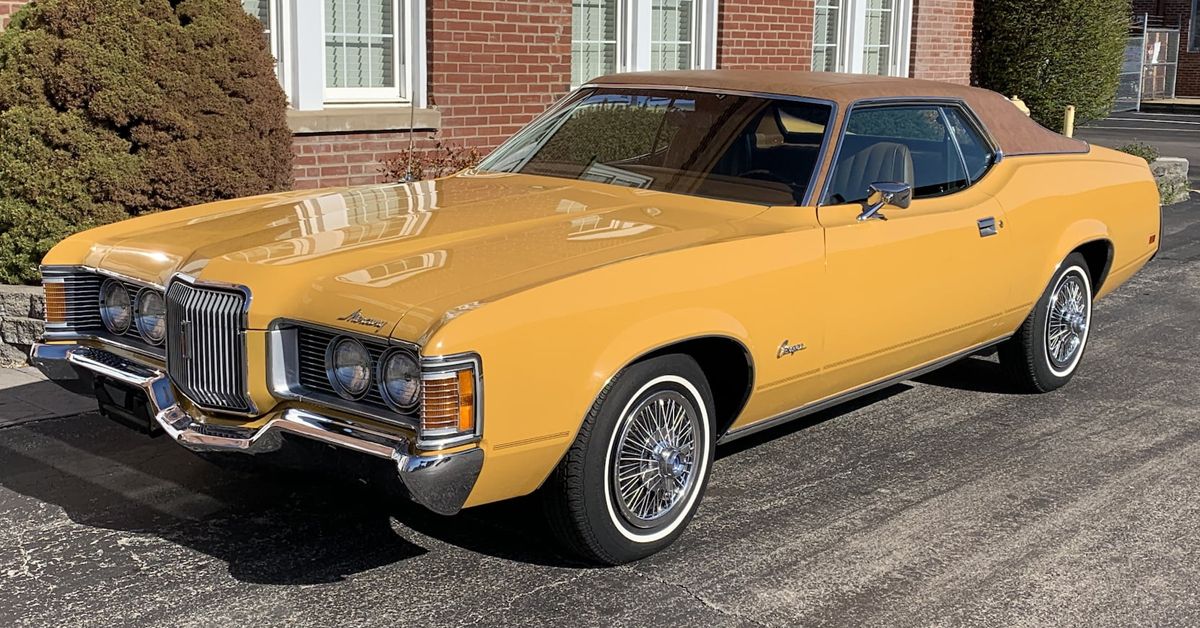 1971 Mercury Cougar Muscle Car with yellow gold paint 