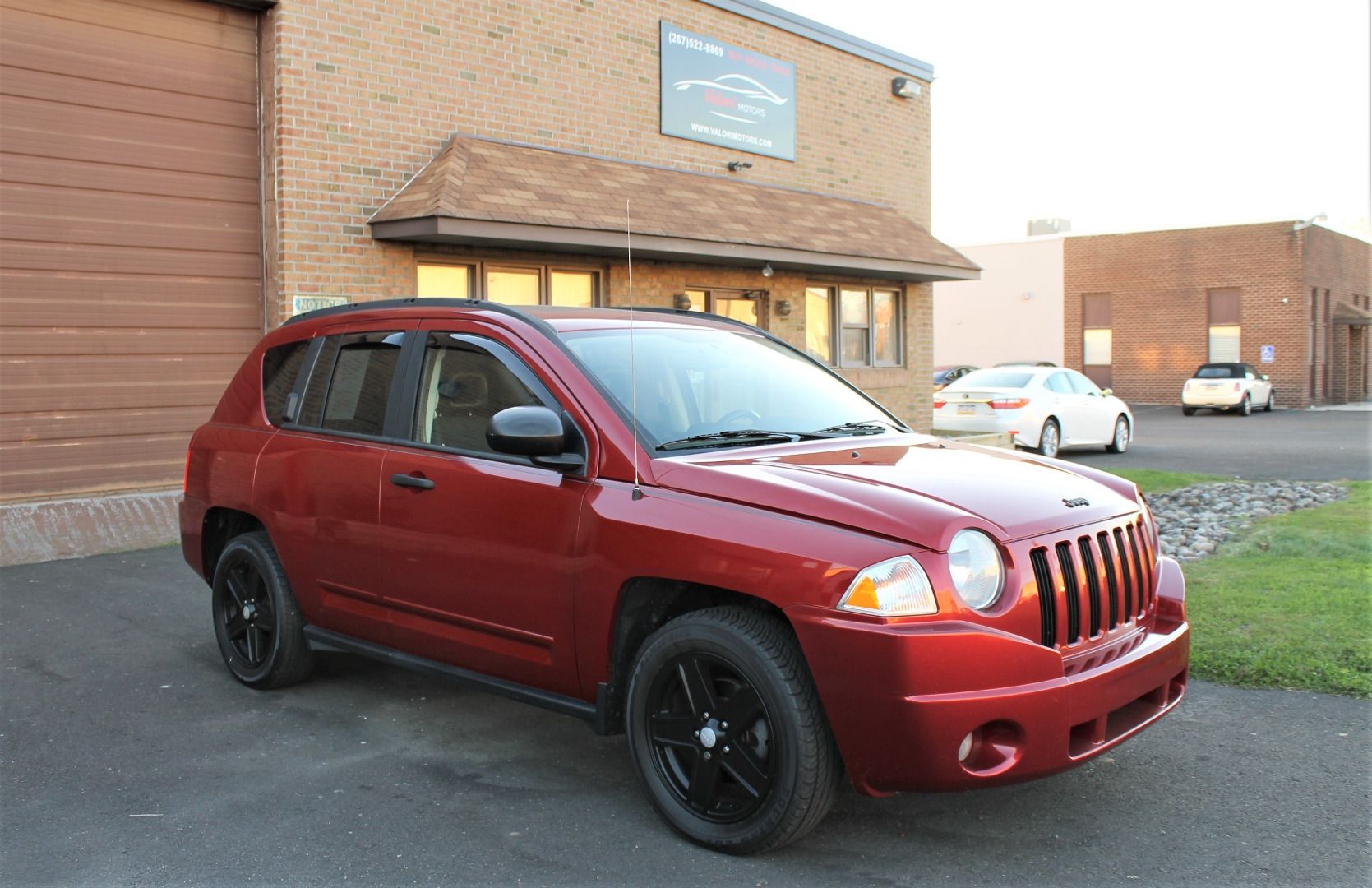 Red 2009 Jeep Compass
